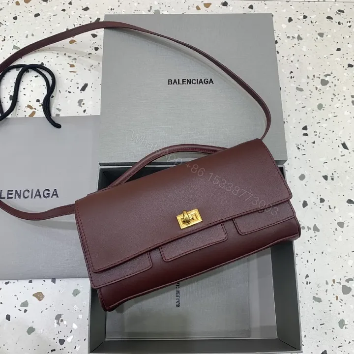 View 1 of Burgundy Calfskin Crossbody: Luxe, Structured, Compact