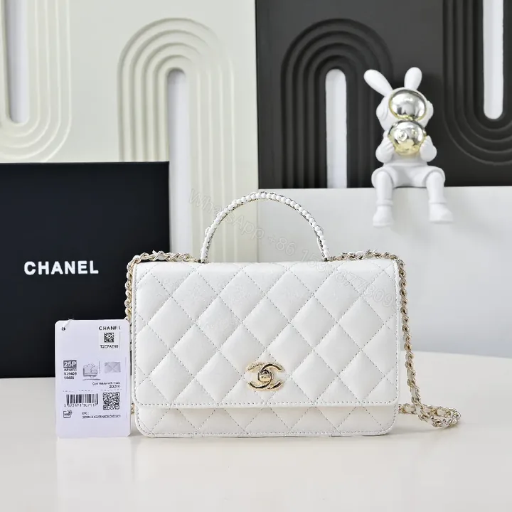View 1 of White Quilted Shoulder Bag with Gold Chain - Luxe Everyday Elegance
