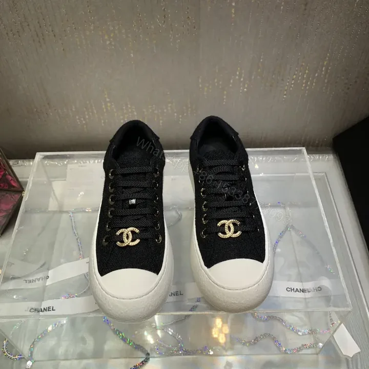 View 1 of Chanel-Inspired Canvas Sneakers: Black & White Luxe Comfort