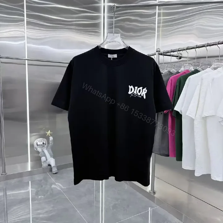 View 1 of Black Cotton Tee: Minimalist Graphic, Designer-Inspired Logo, Unisex Short Sleeve T-Shirt
