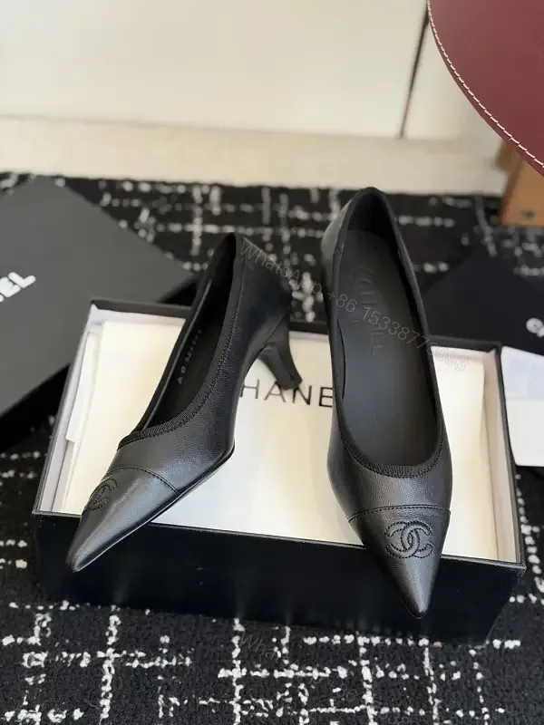 View 1 of Black Leather Pointed-Toe Pumps Chanel Logo Pumps