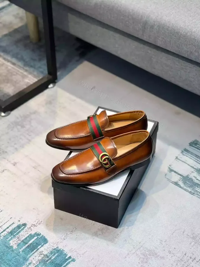 View 1 of GUCCI LEATHER LOAFER WITH DOUBLE G AND WEB IN BROWN – LDG26
