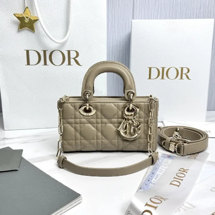 View 1 of Chic Taupe Quilted Mini Bag with Gold Hardware