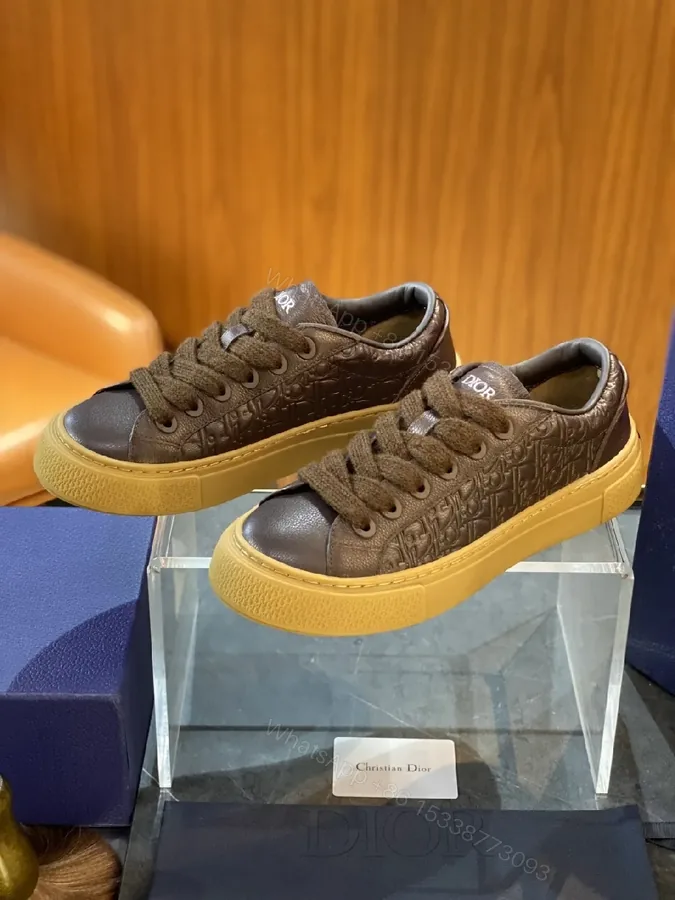 View 1 of Brown Leather Embossed Low-Top Sneakers with Gum Sole