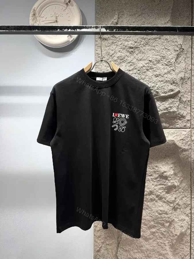 View 1 of Black Cotton Tee with Subtle Embroidered Graphic, Minimal Luxury, Everyday Wear