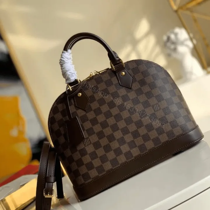 View 1 of Louis Vuitton Damier Ebene Alma PM Caro Pattern Handbags 32mm