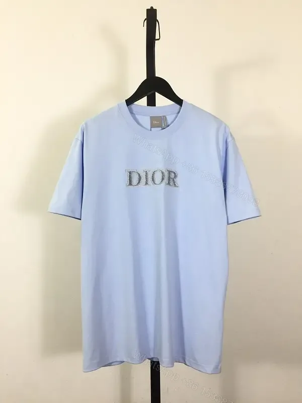 View 1 of Light Blue Oversized Tee with Sparkling DIOR Logo Embroidery, Short-Sleeve, Relaxed Fit
