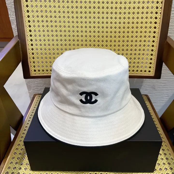 View 1 of White Cotton Bucket Hat - Luxe Minimalist, Subtle Logo