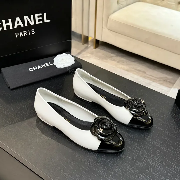 View 1 of Chic White & Black Ballet Flats with Rose Embellishment