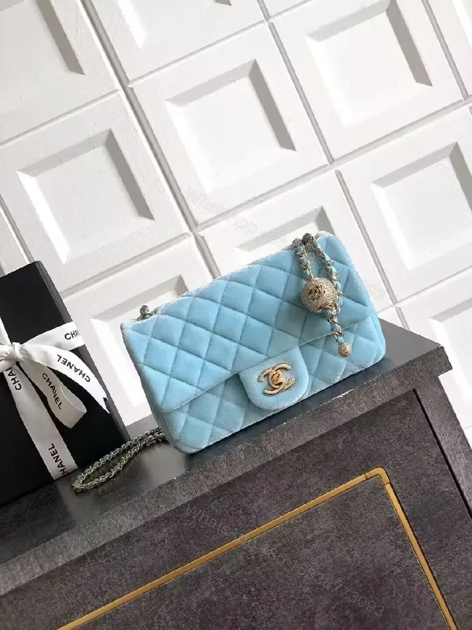 View 1 of Pastel Blue Quilted Box Bag with Chain Strap - Luxe Elevation