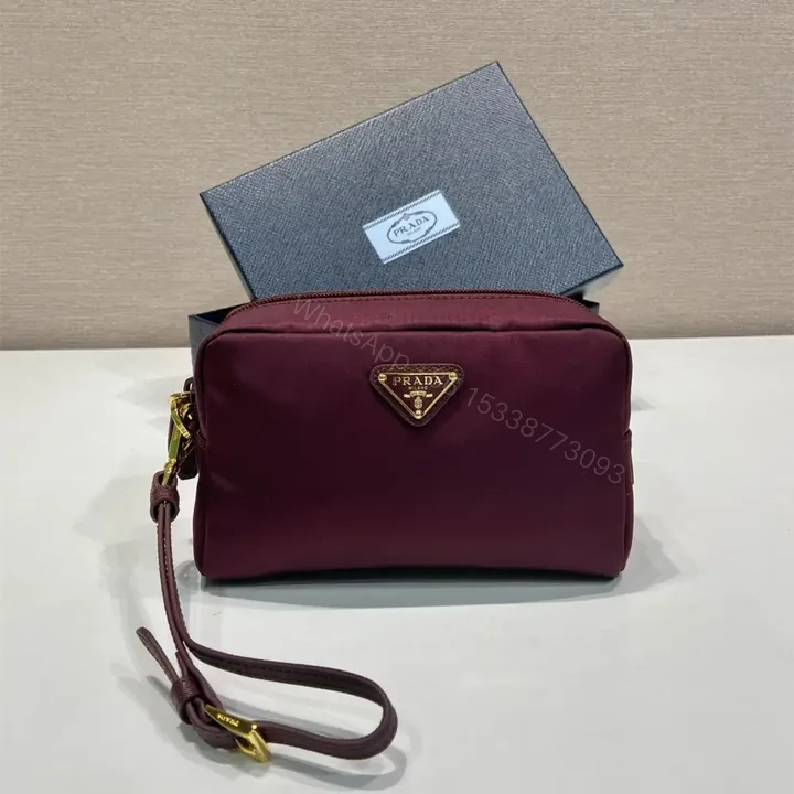 View 1 of 高仿Prada*RE-Nylon系列1NS021手拿包酒紅色小號免檢版