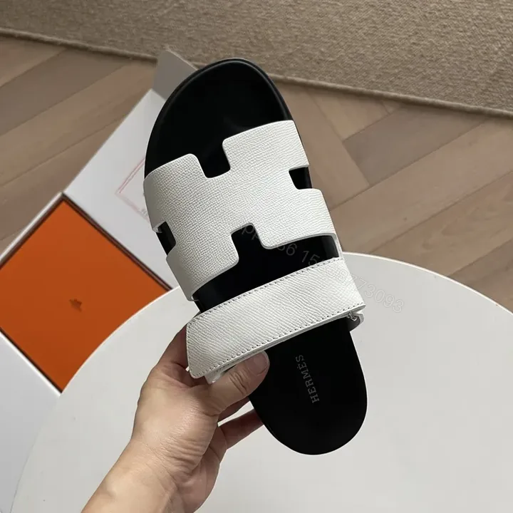 View 1 of White Leather Strap Sandals: Omega Cutouts, All-Day Comfort