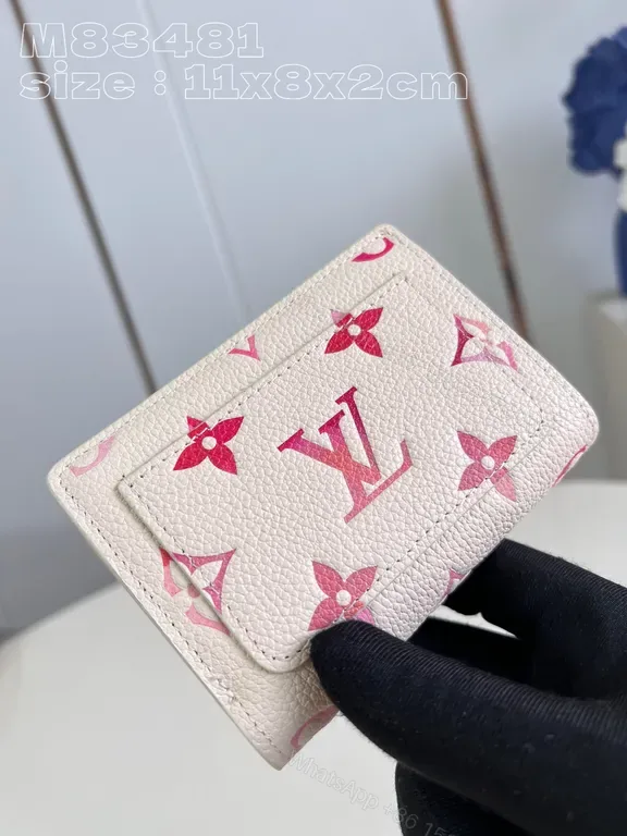 View 1 of Pink Monogram Compact Wallet - Pebbled Leather, Bi-Fold