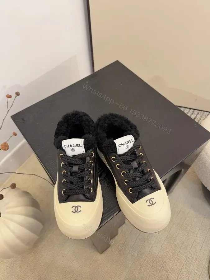 View 1 of Chic Leather High-Top Sneakers with Plush Warmth and Accents