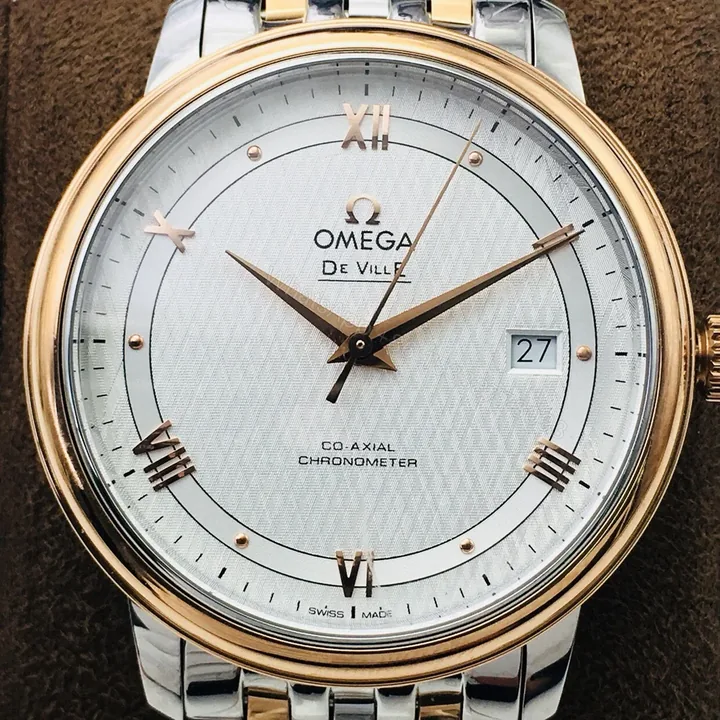 View 1 of Omega De Ville Prestige Co-Axial Stainless Steel Yellow Gold Vintage Silver Silk Bracelet 424.20.33.20.52.001