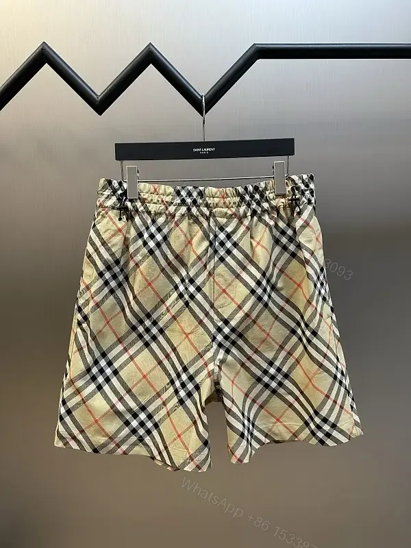 View 1 of Beige Burberry-Style Cotton Plaid Shorts with Drawstring Elastic Waist