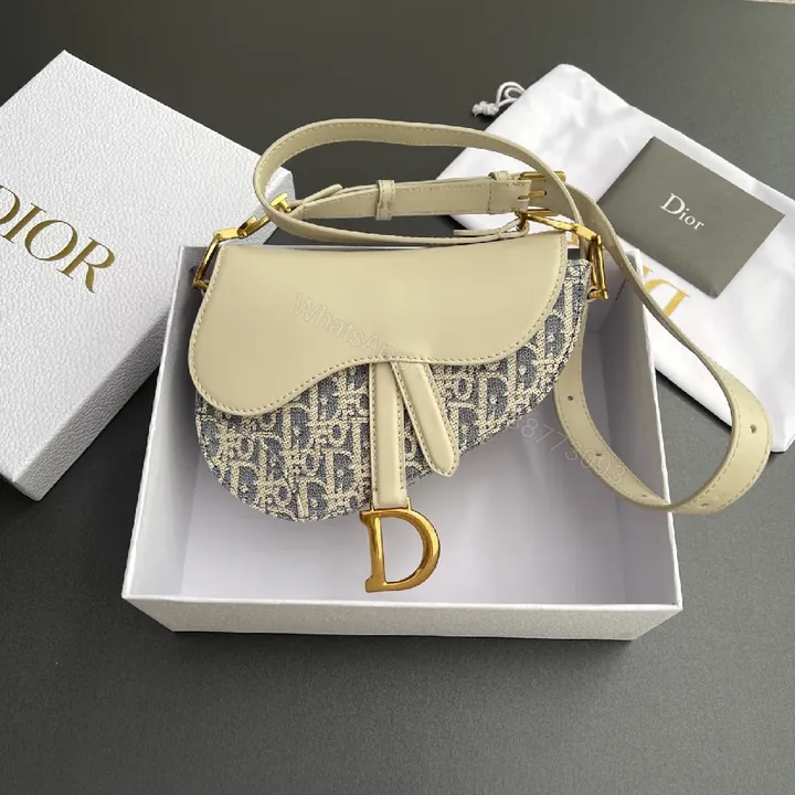 View 1 of Chic Textured Saddle Bag: Modern Luxe Shoulder Bag