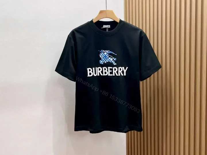 View 1 of Black Knit Tee with Embroidered Crest Logo – Premium Street Style T-shirt