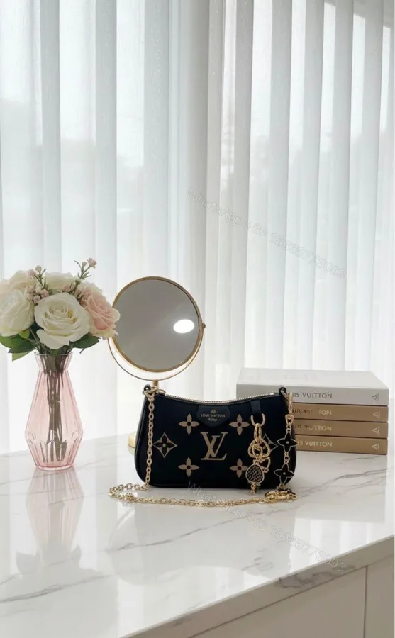 View 1 of Louis Vuitton Monogram Empreinte Leather Bag Black First Copy | AAA+ Replica