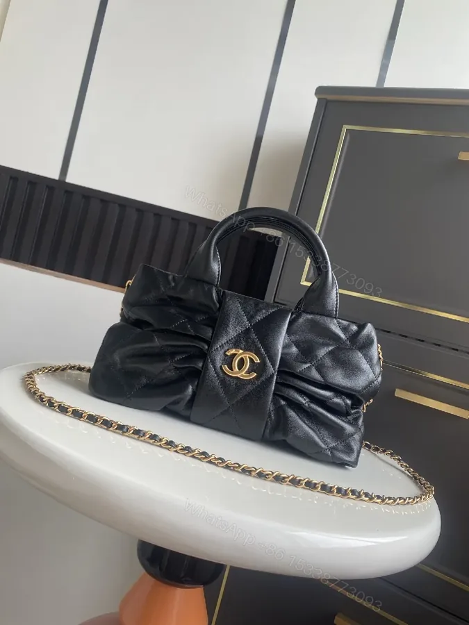 View 1 of Quilted Mini Bag: Black, Satin-like, Chic, Gold Hardware, Clutch