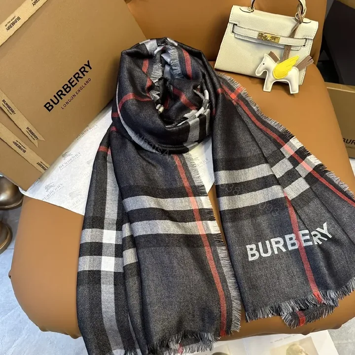 View 1 of Charcoal Plaid Wool-Blend Scarf with Fringe Detailing
