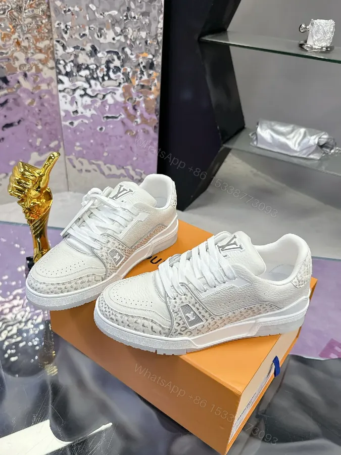 View 1 of White Leather-Luxe Snakeskin Runner: Modern Minimal Luxury Sneaker