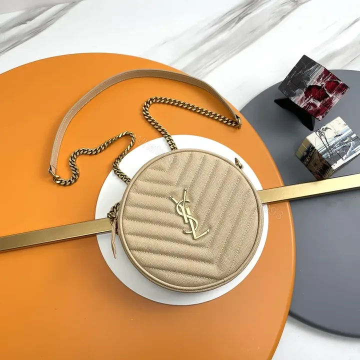 View 1 of Quilted Circular Crossbody Bag with Gold-YSL Emblem