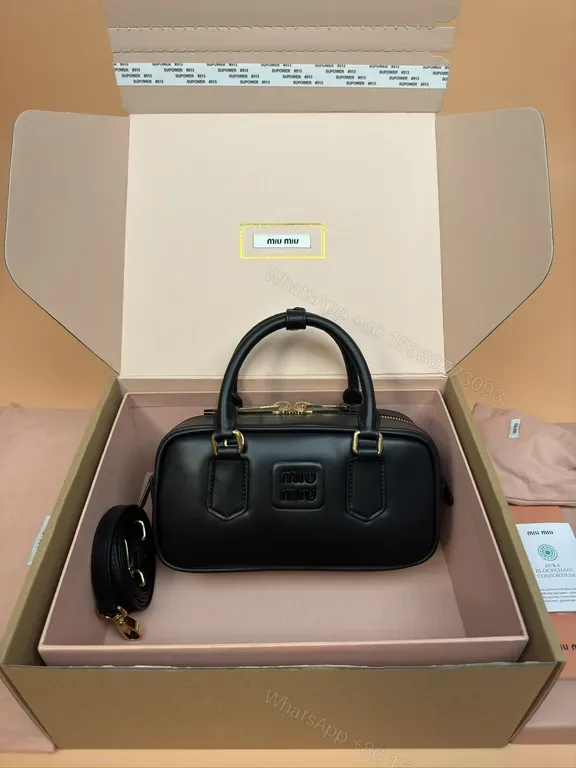 View 1 of Structured Black Leather Satchel â€” Modern, All-Day Chic, Miu Miu Inspired