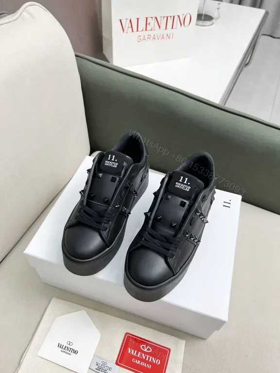 View 1 of Valentino Garavani Black Leather Studded Luxury Sneakers