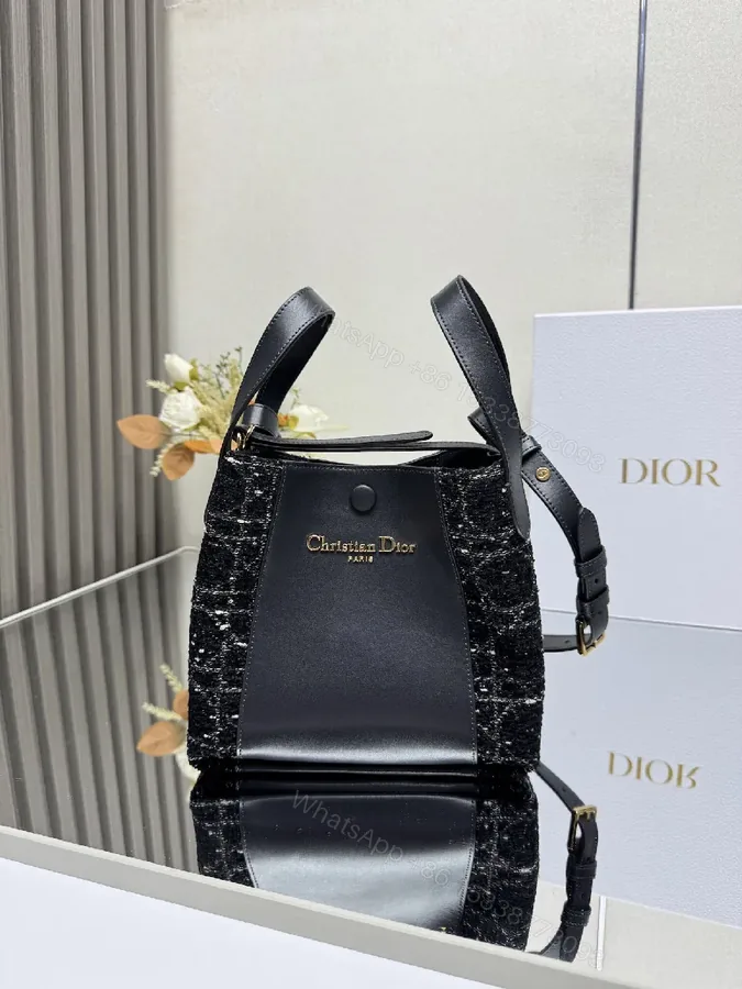 View 1 of Compact Black Leather Tote with Textured Panel, Adjustable Strap