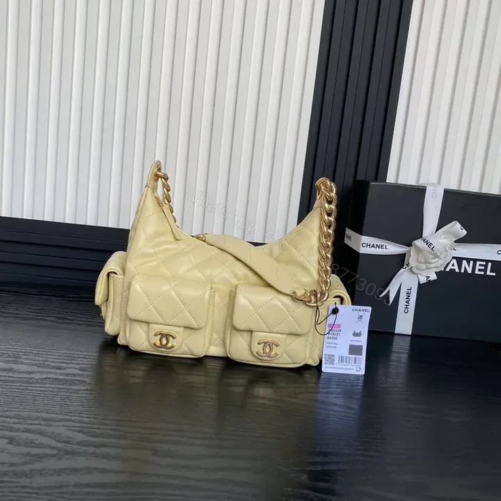 View 1 of Chic Quilted Satchel with Gold Chain Strap â€“ Everyday Luxury
