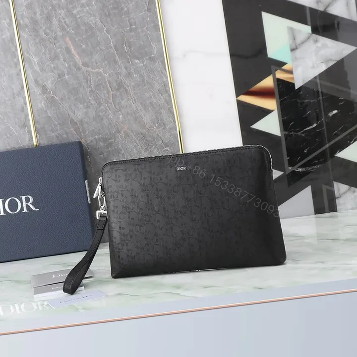 View 1 of Black Dior Monogram Zip Clutch: Sleek, Secure, Multifunctional Carry
