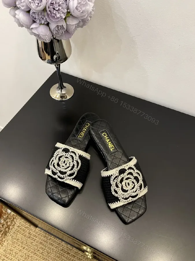 View 1 of Black Quilted Slide with Crochet Camellia Detail - Open-Toe Comfort
