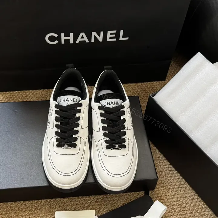 View 1 of Minimalist White Leather Sneakers â€“ Luxe Chanel-Inspired Details