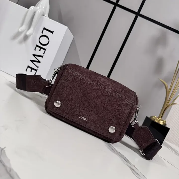 View 1 of Compact Burgundy Pebbled Leather Messenger