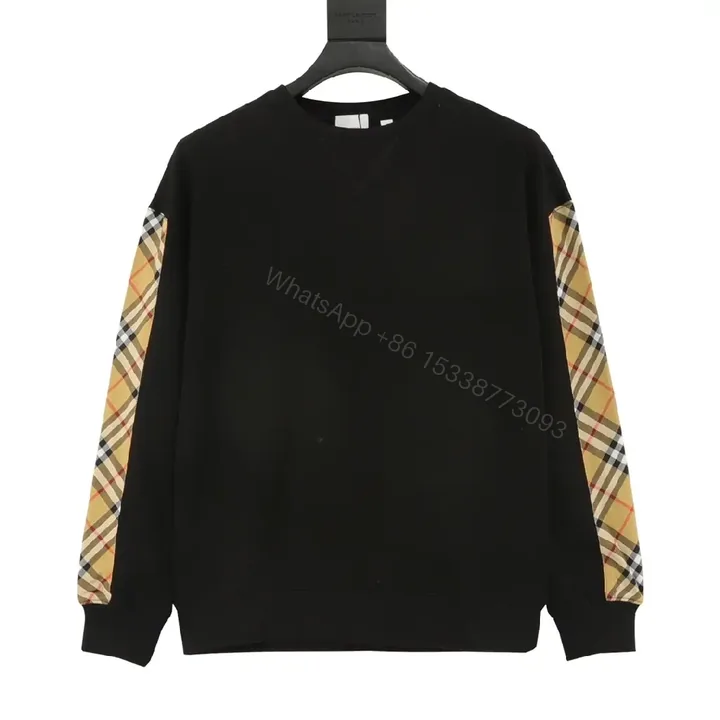 View 1 of Black Knit Crewneck with Signature Check Sleeves, Slim Fit, Luxury Casual