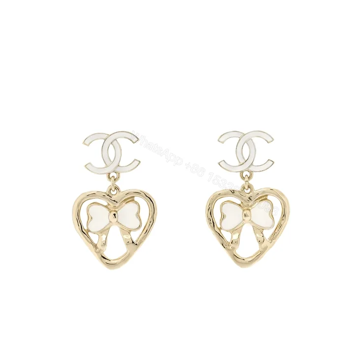 View 1 of Chanel Metal Enamel Cc Heart Drop Earrings Gold