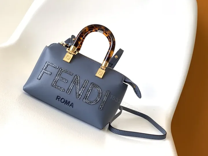 View 1 of Slate-Blue Tortoise-Accent Mini Bag — Luxe, Logo-Detail Crossbody
