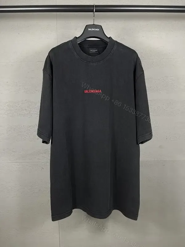 View 1 of Oversized Black Tee Dress with Subtle Red Logo, Modern Couture Edge