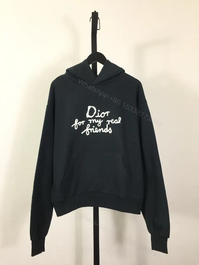 View 1 of White-on-Black Luxury Hoodie with Scripted Logo