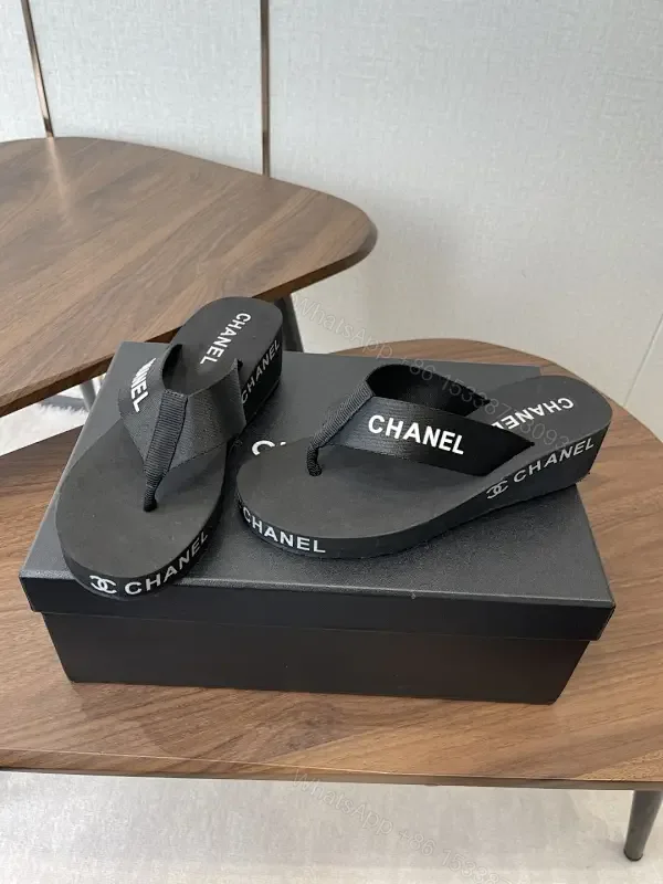 View 1 of Minimalist Black Luxe: Couture-Inspired Flip-Flops with Subtle Logo