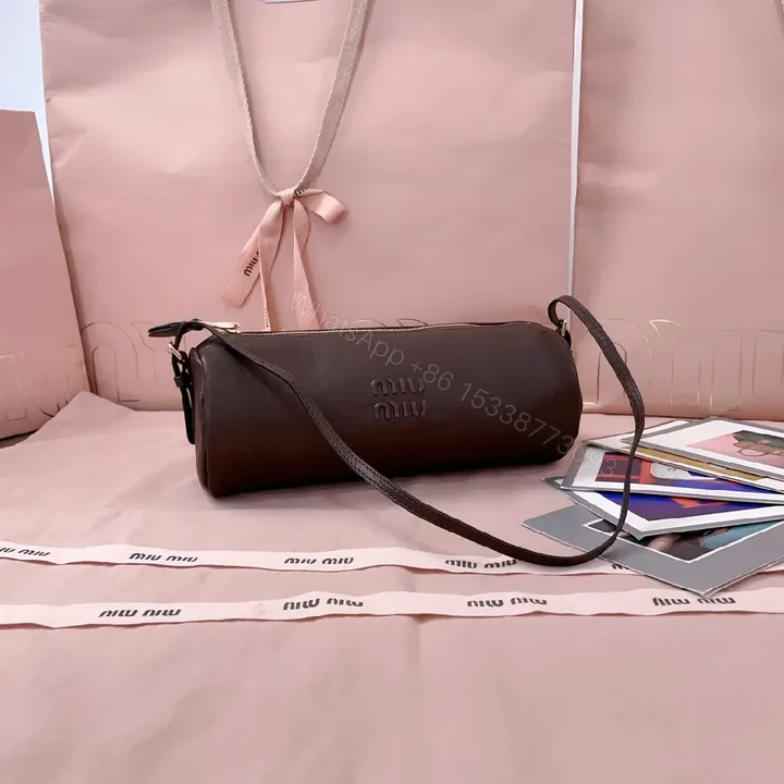 View 1 of Compact Luxury Leather Bag with Subtle Embossing