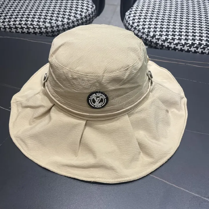 View 1 of Beige Textured Bucket Hat with Emblem, Everyday Luxury