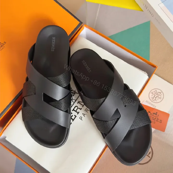 View 1 of Black Leather Cross-Strap Sandals: Minimal, Luxe Comfort