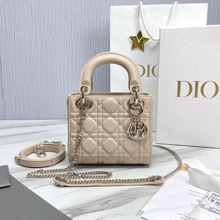 View 1 of Beige Vegan Leather Quilted Handbag with Dior Charm