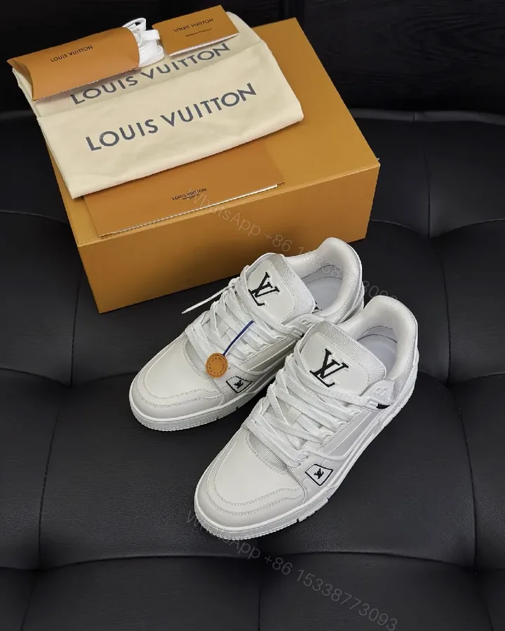 View 1 of White Leather Sneaker - Minimalist Luxe with Signature Details