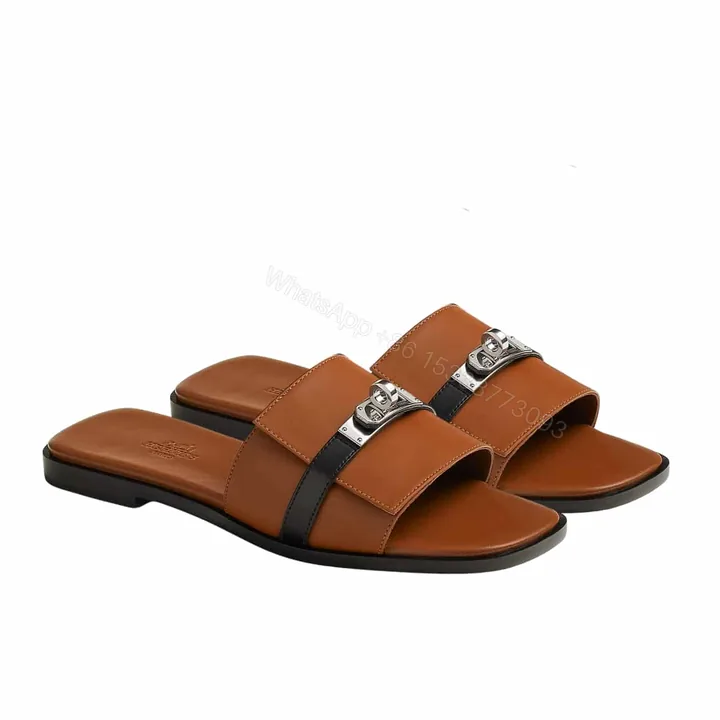 View 1 of HERMES GIULIA SANDAL GOLD AND NOIR H231056Z 20360
