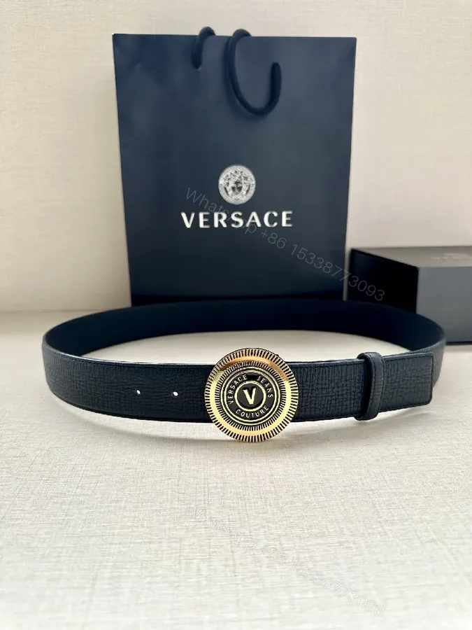 View 1 of Black Leather Belt with Gold Emblem - Premium, Textured Style