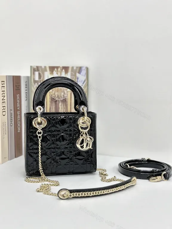 View 1 of Small-Handled Black Patent Bag: Chain Detail & Charms Brand-To-Go