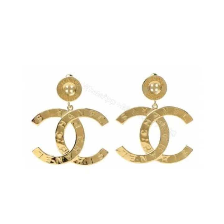 View 1 of Chanel Paris Button Earrings